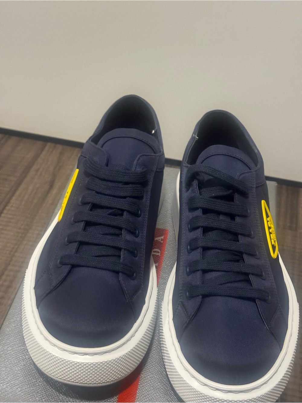 Prada Navy Sneakers with Yellow Logo Patch and White Platform Sole